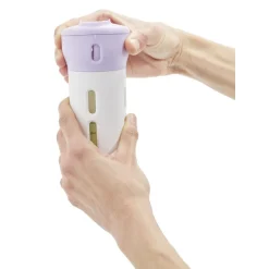 Distributeur de voyage 4-en-1 bouchon pivotant