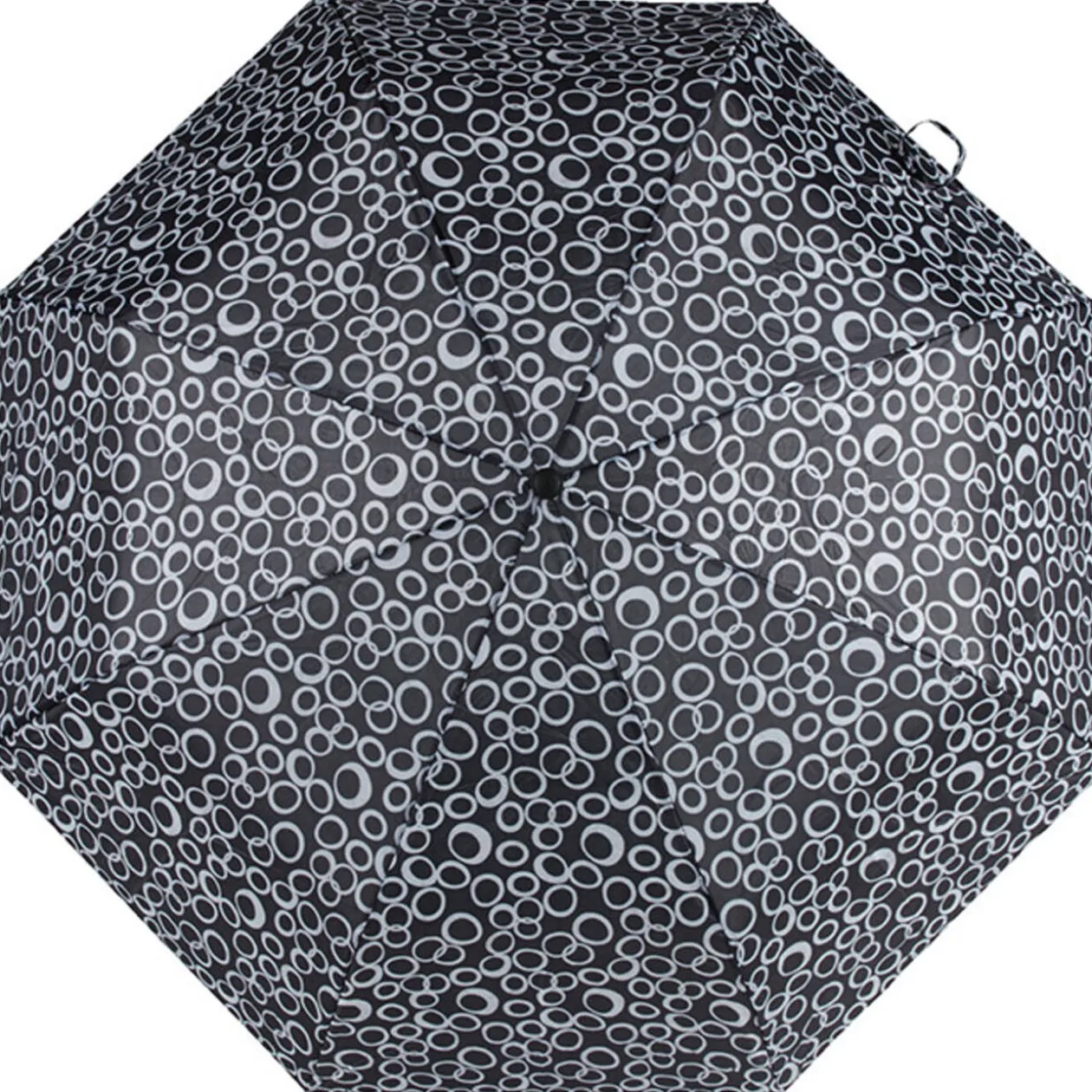 Parapluie noir à cercles blancs
