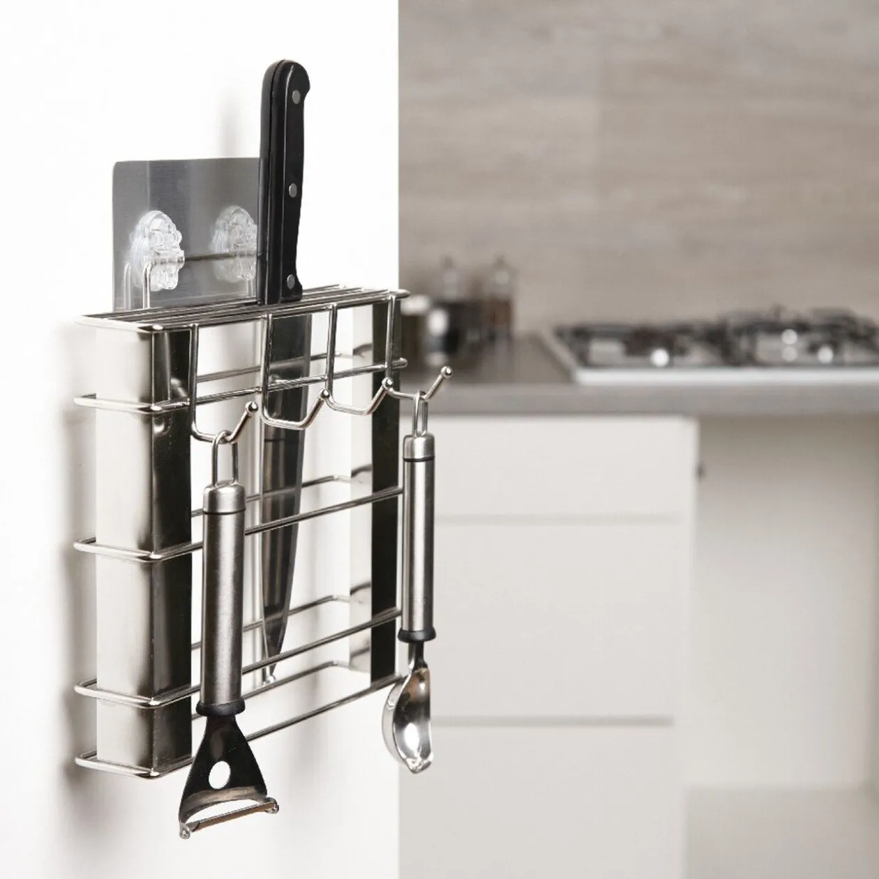 Support à ustensiles adhésif